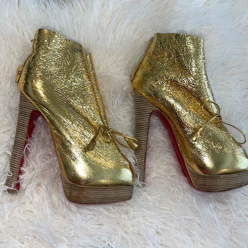 Christian Louboutin gold heels